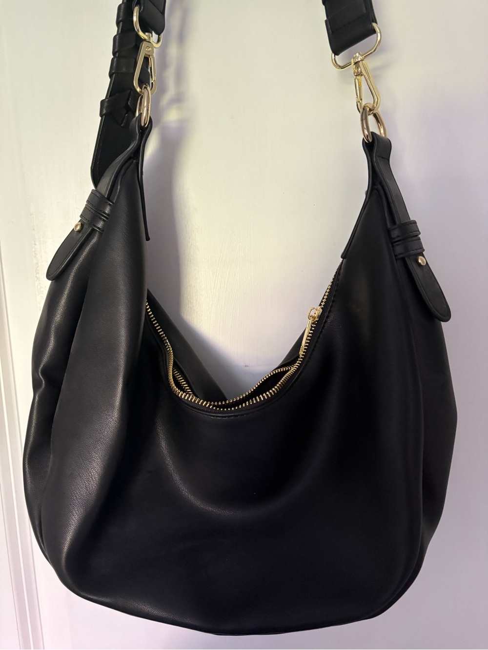 Sleek Black Leather Hobo Handbag with Gold Hardware